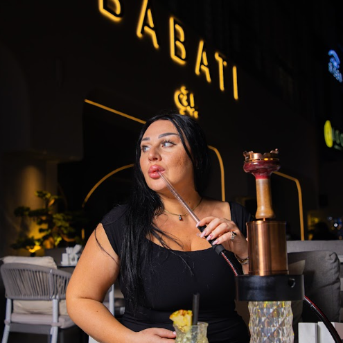 lady enjoying shisha at babati