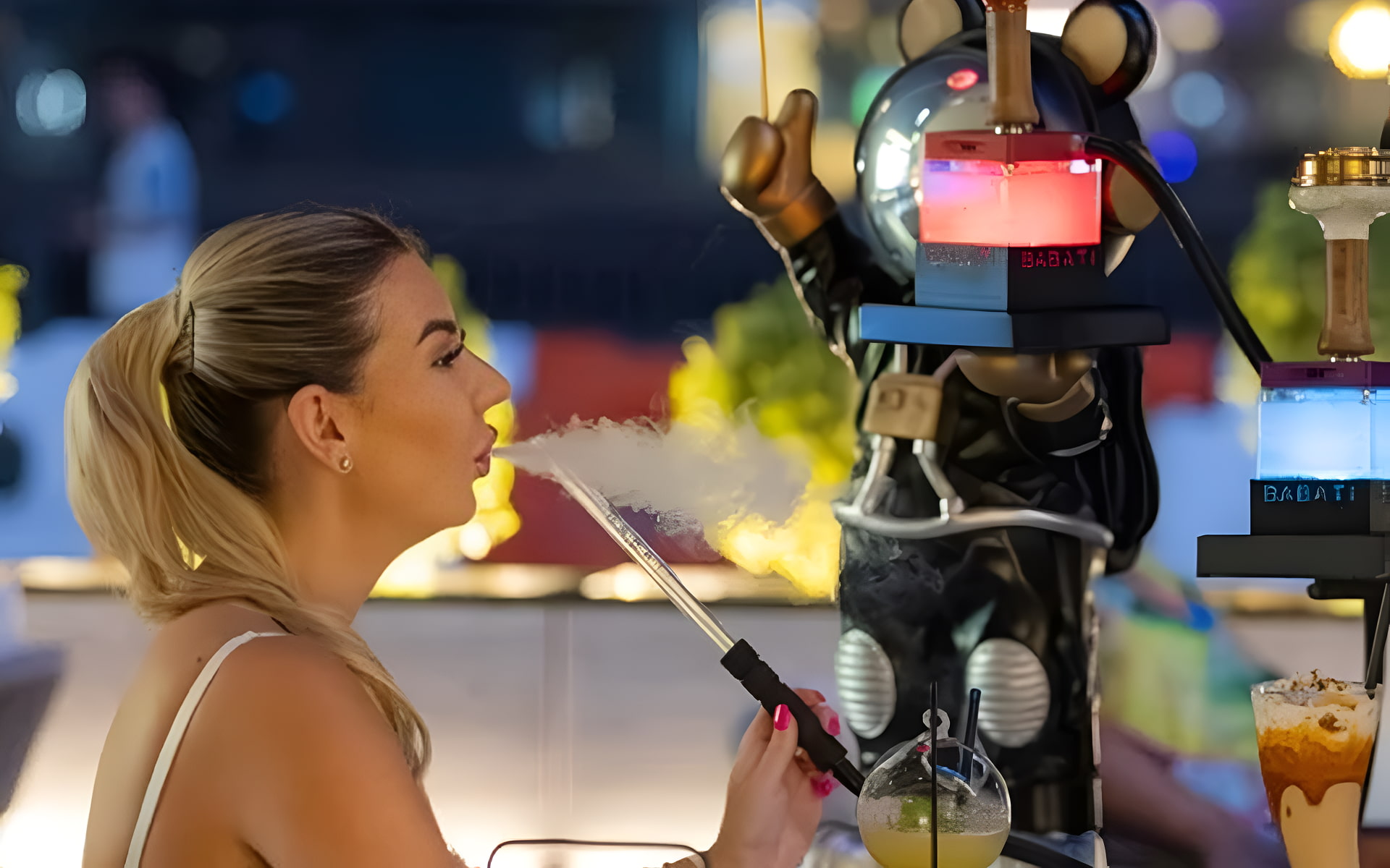 Woman with ponytail uses bear-shaped hookah with glowing BABATI logo.