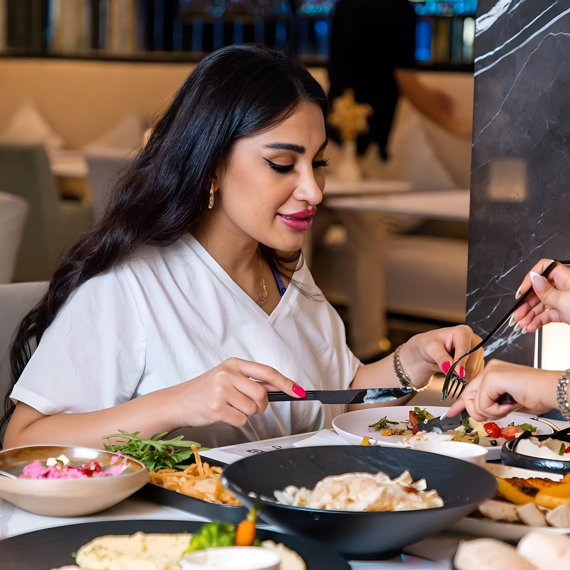 lady enjoying meal at babati