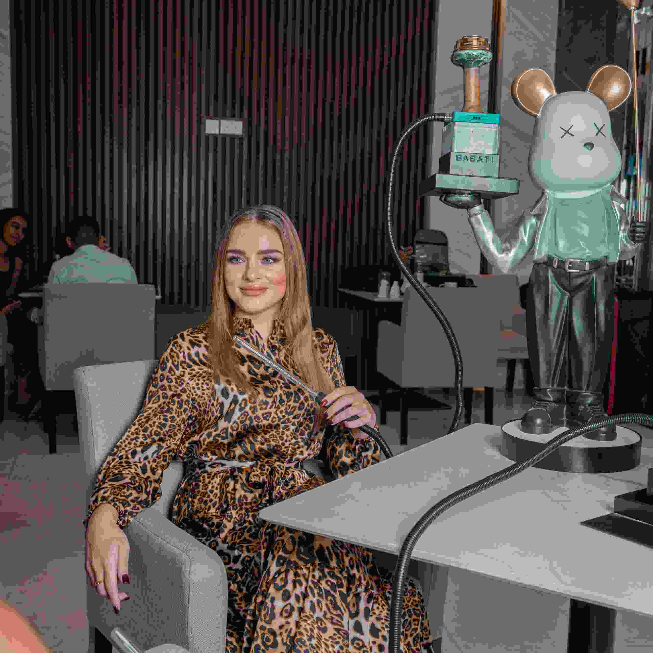 beautiful lady enjoying fancy hooka at Babati restaurant