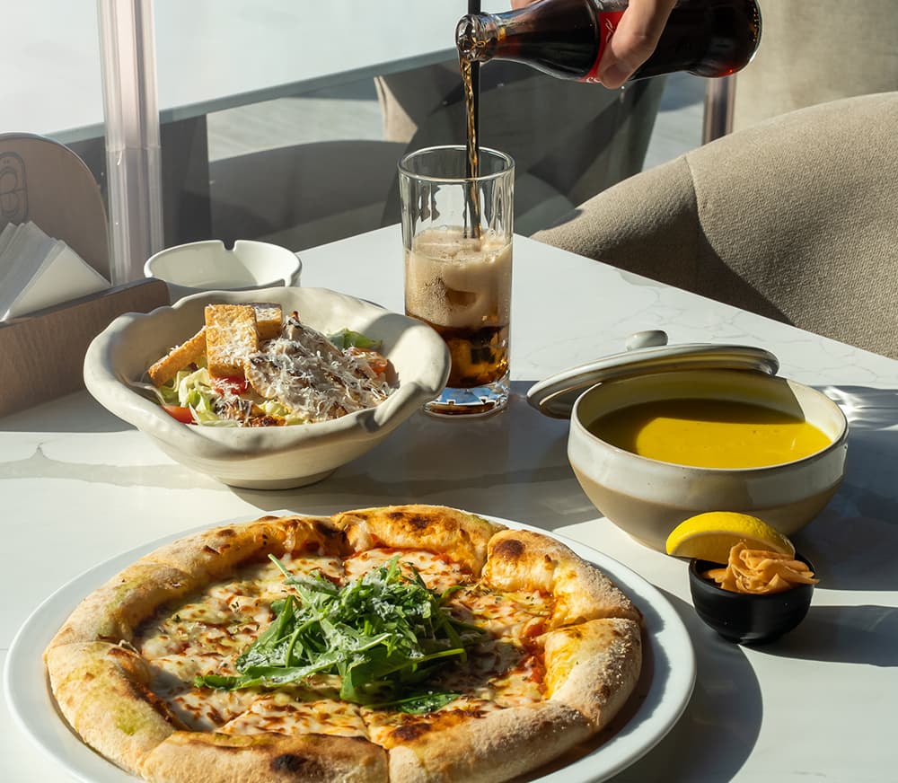 Pizza, salad, and soup combo from the lunch menu at Babati Restaurant and lounge.
